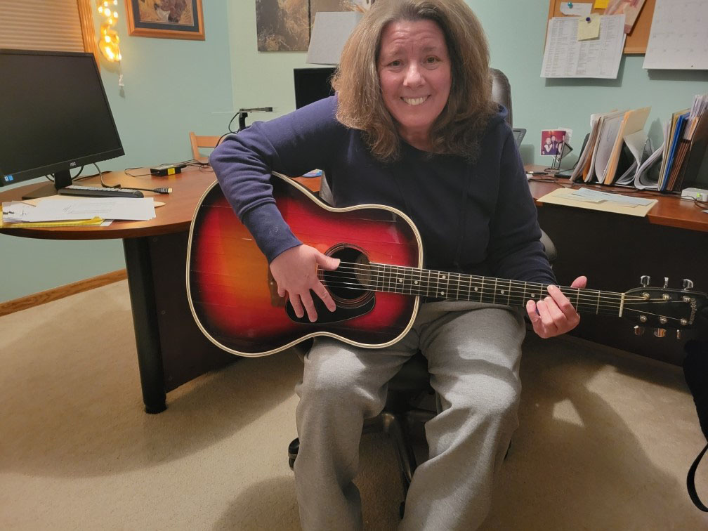 Lisa playing guitar